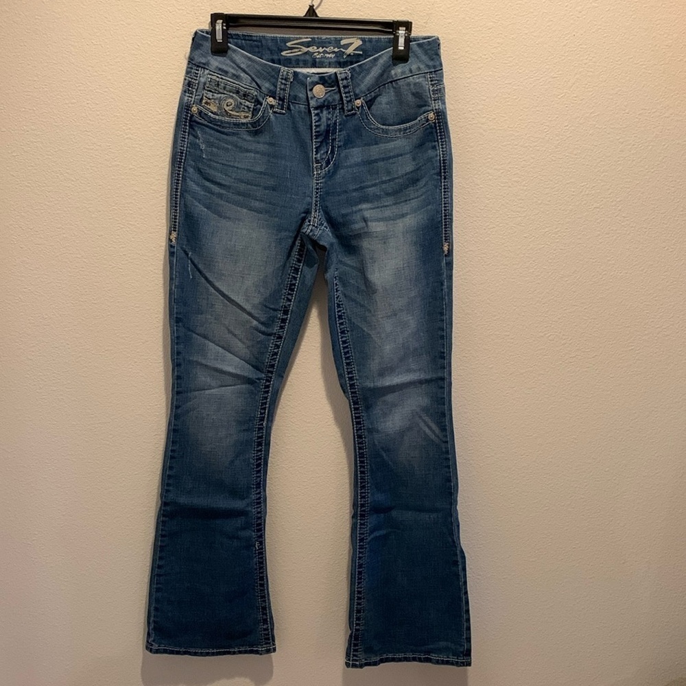 Seven Womens Bootcut Jeans. Mid-rise. Lighter Wash. Distressed. Pocket detail. 8